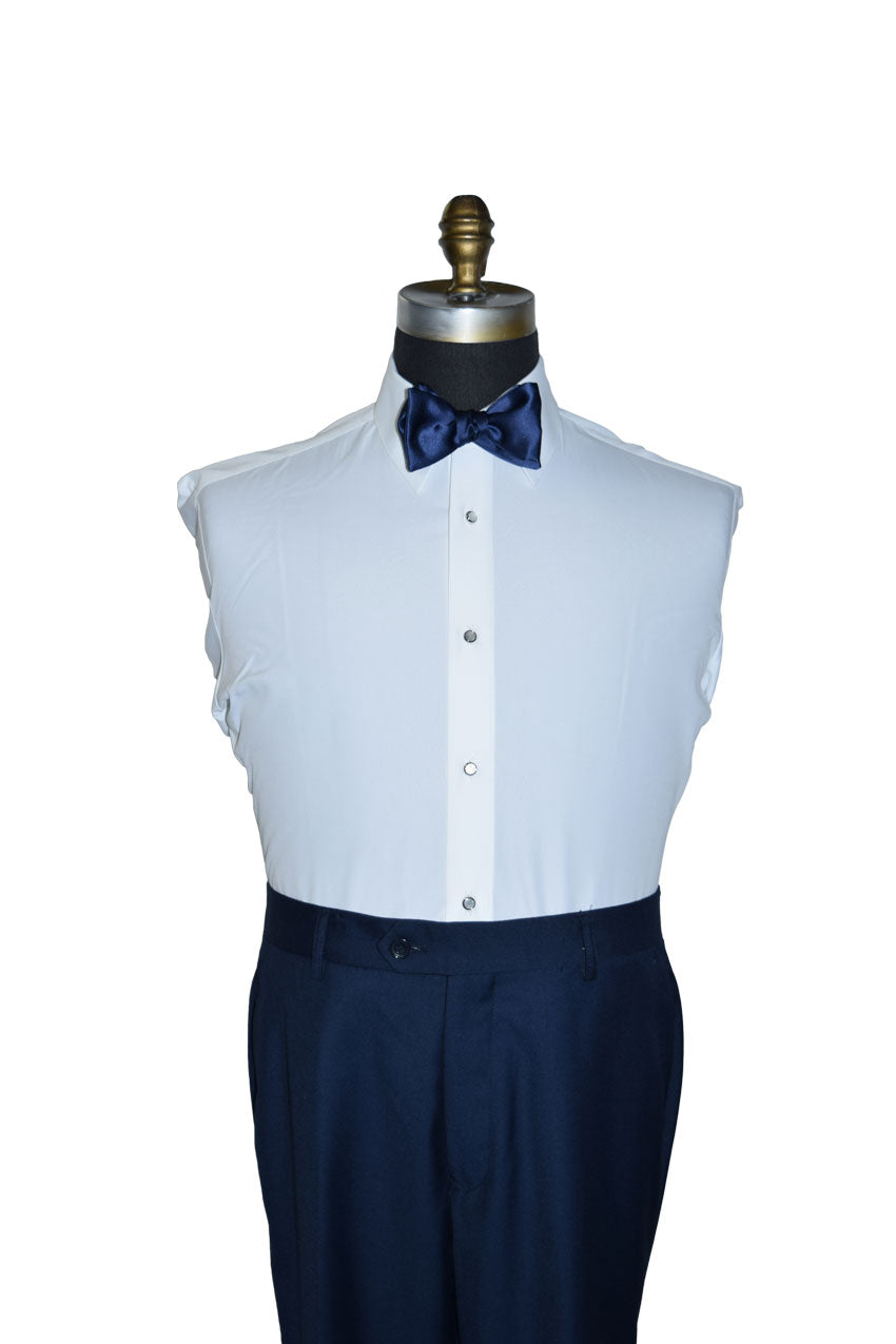 White dress shirt with navy blue satin "tie-yourself"  bow tie and navy pants on a mannequin against a white background