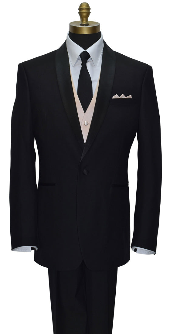 Black shawl-collar tuxedo with white shirt and black necktie with a nude tuxedo vest and petal handkerchief on a mannequin against a white background