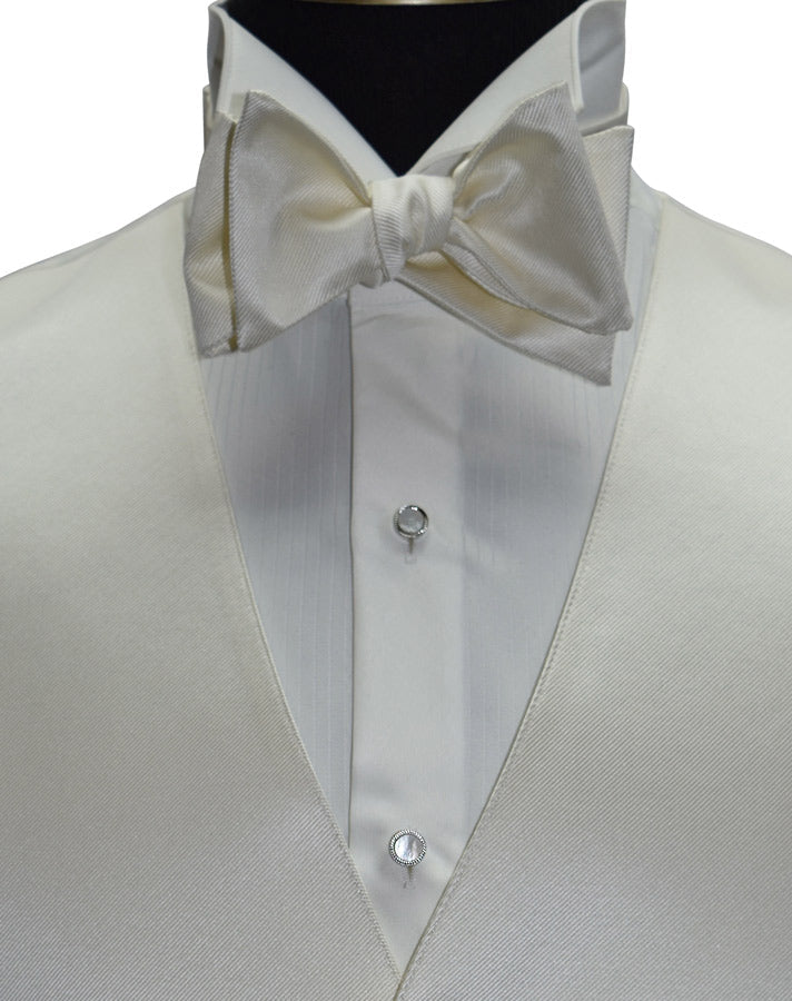 very close-up front view mannequin wearing an off-white vest and off-white tuxedo shirt and an off-white "tie-yourself" bowtie against a white background