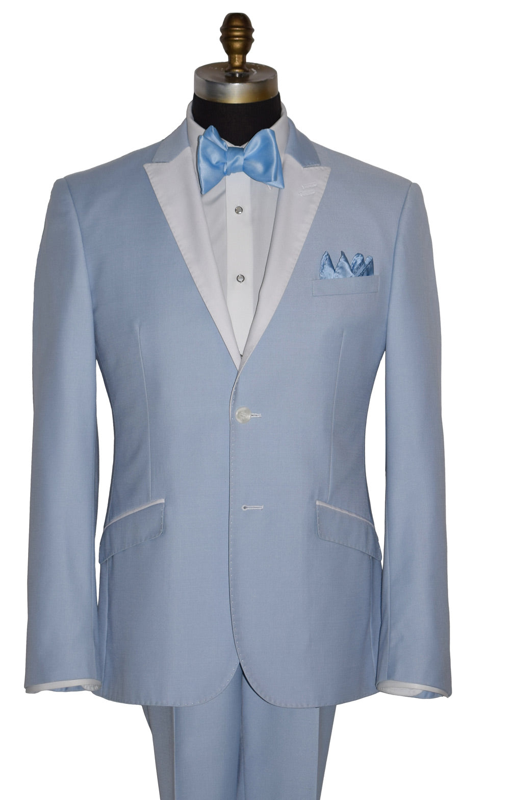 close-up life size mannequin wearing a powder blue tuxedo with a blue bowtie and mother-of-pearl studs and cufflinks against a white background