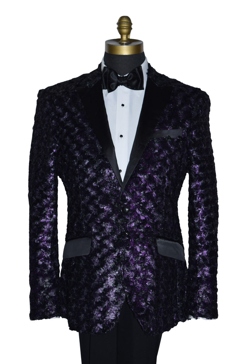 close-up life size mannequin wearing a purple tuxedo with black lapels with a white tuxedo shirt and black bowtie against a white background