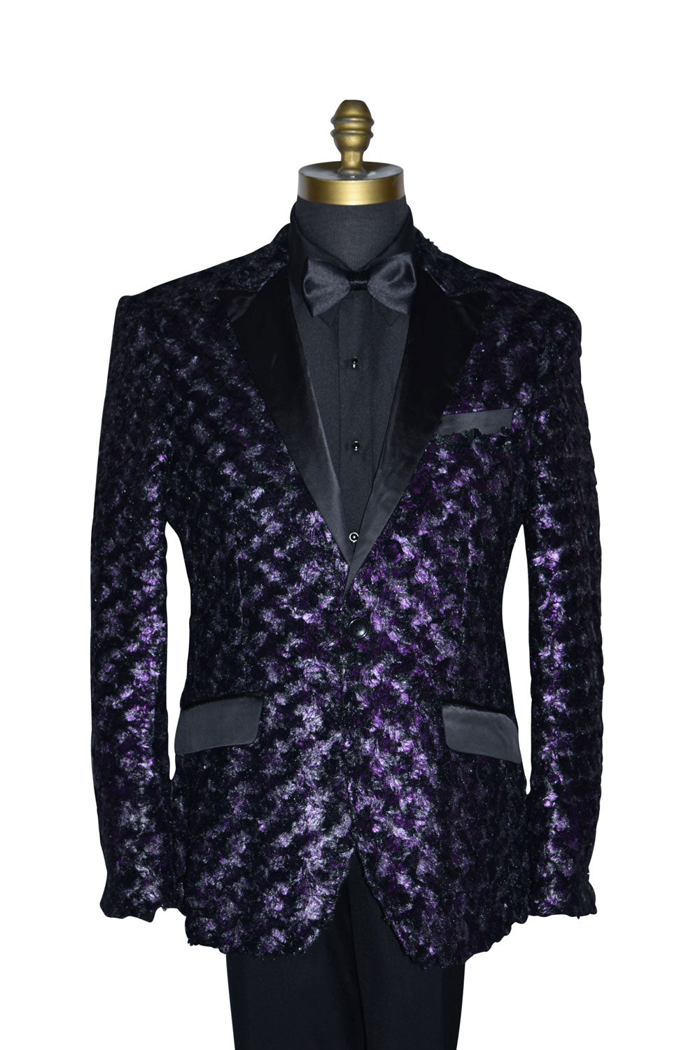 close-uplife size mannequin wearing a purple tuxedo with black lapels with a black tuxedo shirt and black satin bowtie against a white background