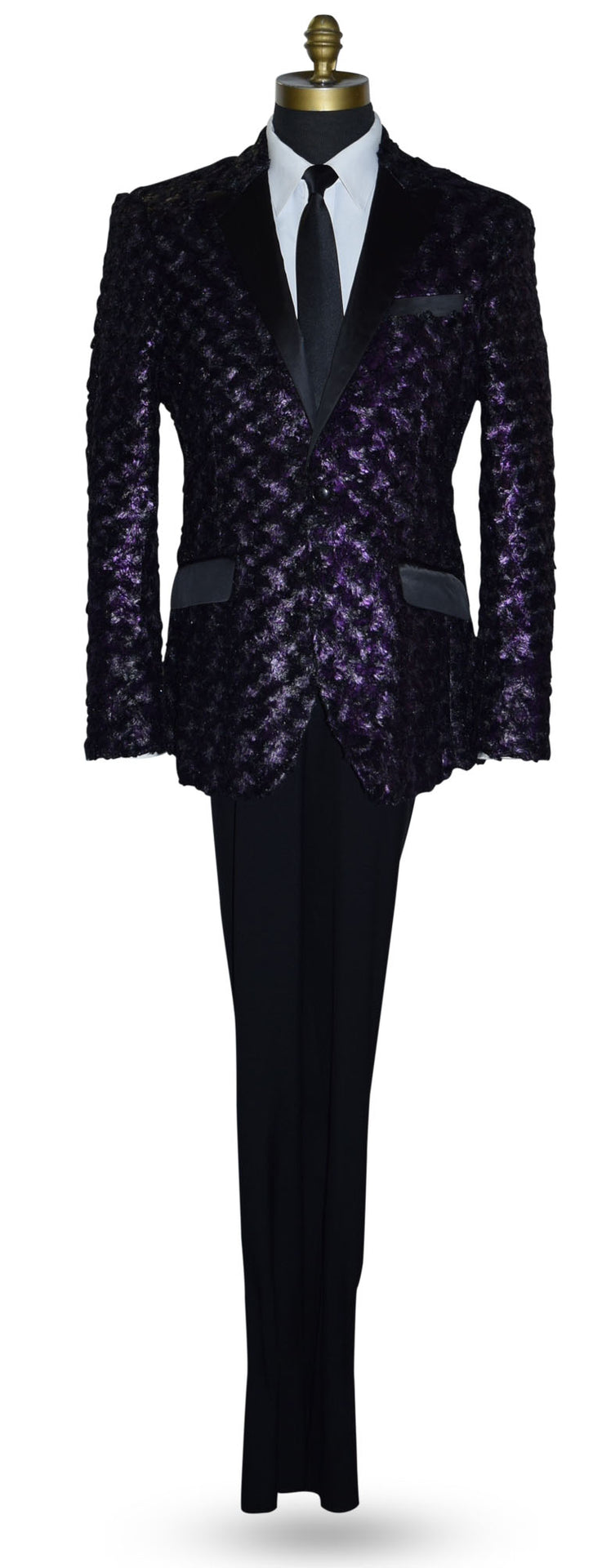 life size mannequin wearing a purple tuxedo with black lapels with a white tuxedo shirt and long black skinny necktie against a white background