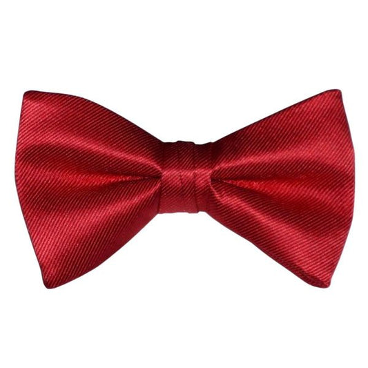 A pre-tied red bowtie with a textured fabric, displayed against a plain background.