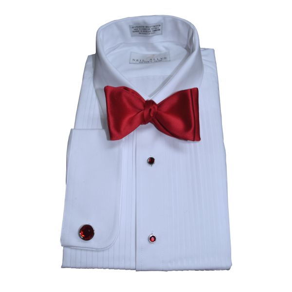 white tuxedo shirt displayed with a red satin tie-yourself bowtie against a white background