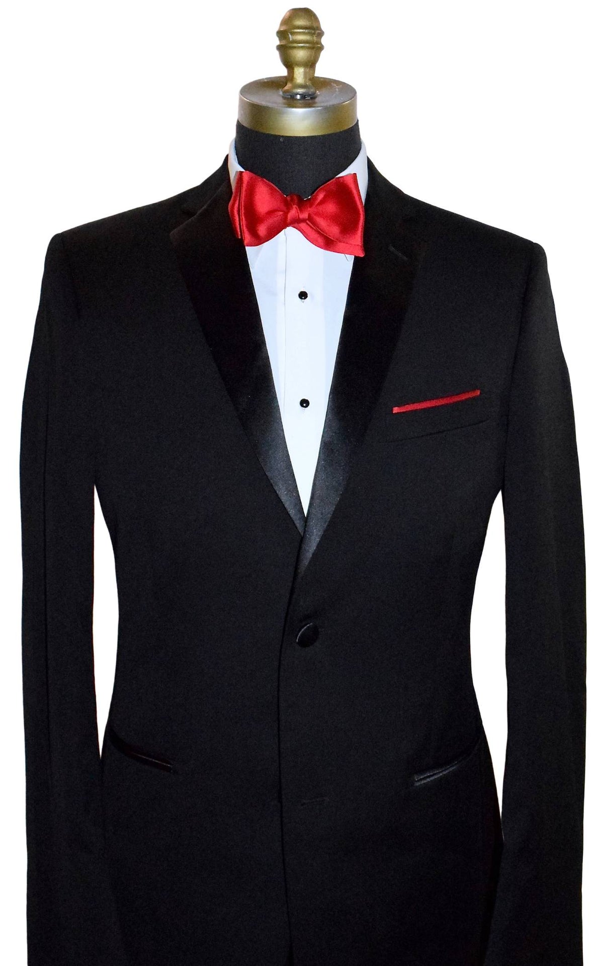 Black tuxedo with a red "self-tie" bow tie on a mannequin against a white background