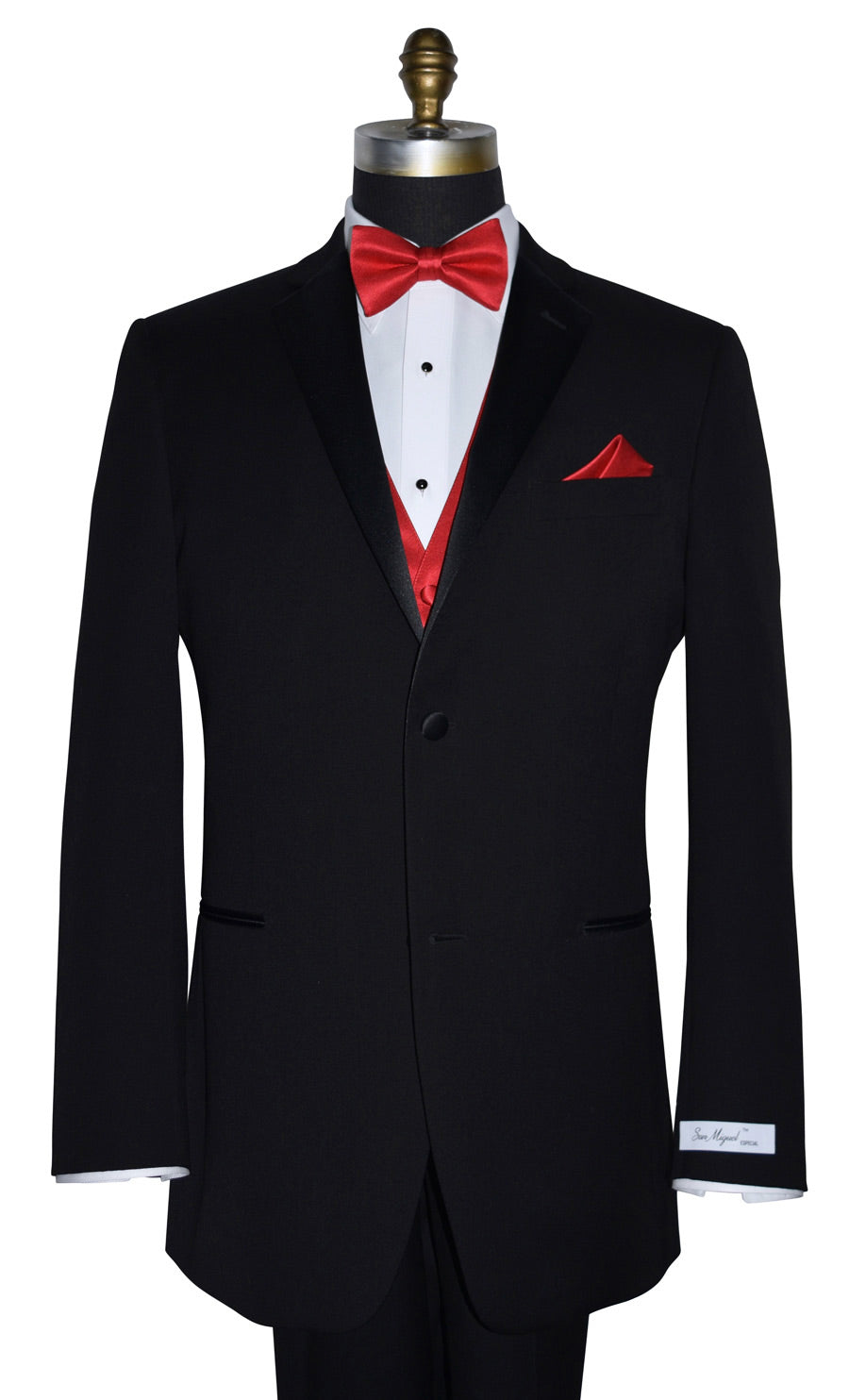 close-up mannequin wearing a "San Miguel Especial" branded black notch lapel tuxedo with a ruby-red bowtie and ruby-red vest against a white background 