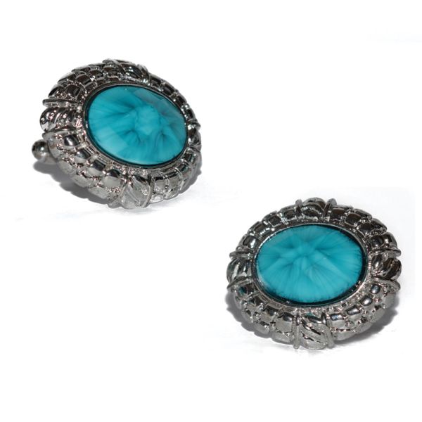 A pair of silver-colored cufflinks with turquoise blue inlays, presented against a white background.