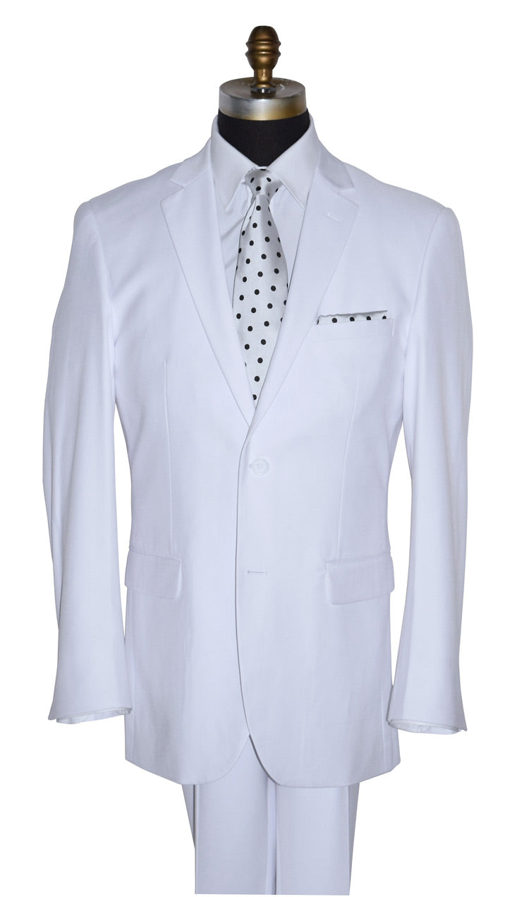 close-up mannequin wearing a mens white suit with a white and black polka-dot satin necktie on a mannequin against a white background
