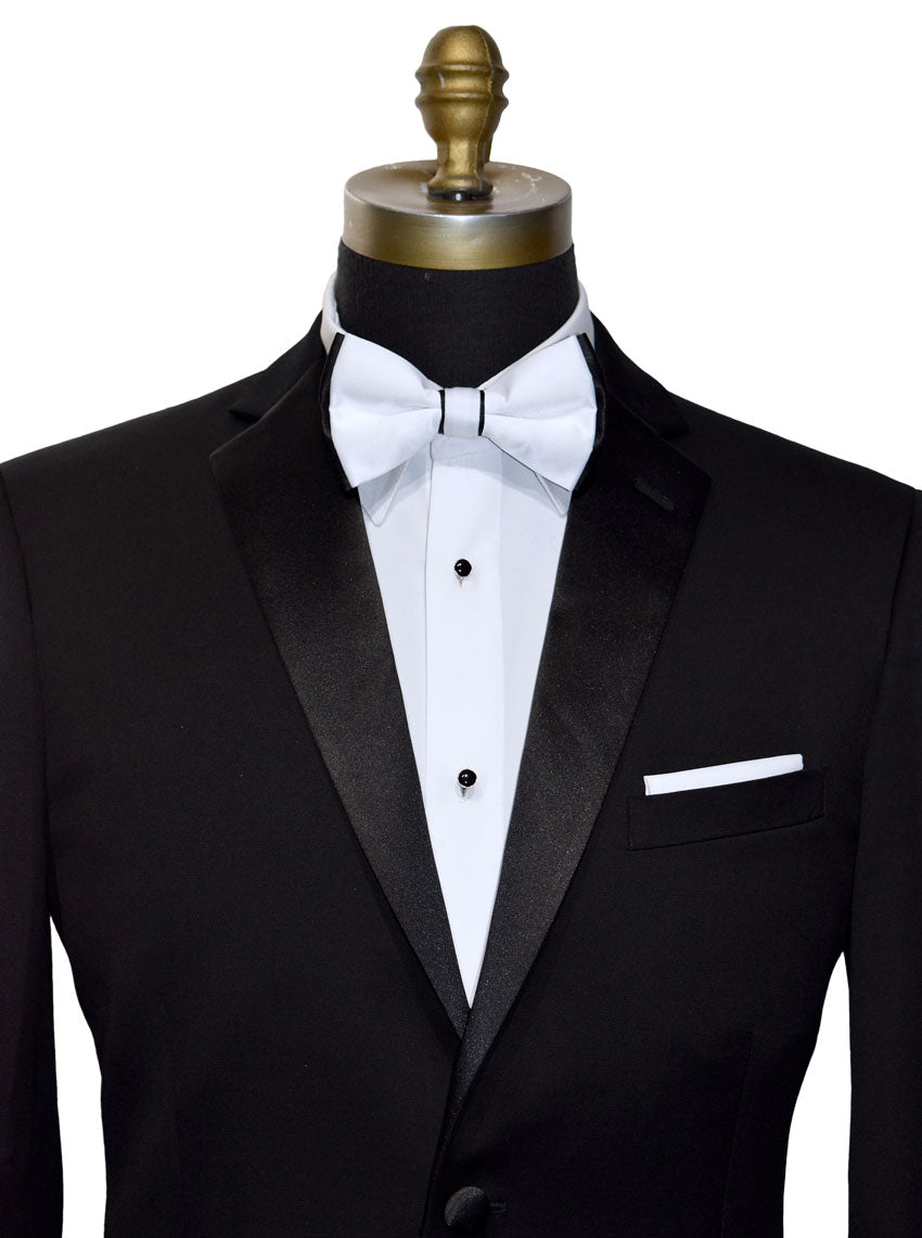 mannequin earing a black tuxedo with a white bowtie with black on the edges of the bowtie against a white background