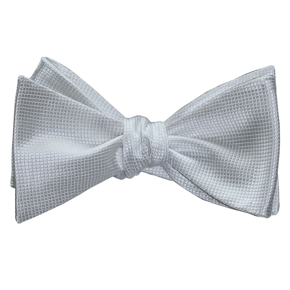 white pique self-tie bowtie on a white background