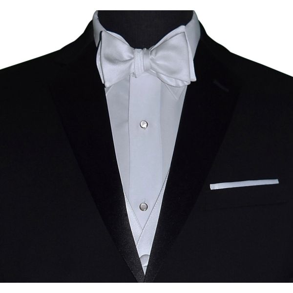 close-up mannequin wearing black tuxedo with white "tie-yourself" bowtie in-front of a white background