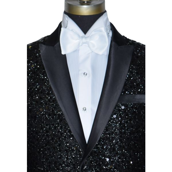close-up mannequin wearing a black sequins tuxedo wearing a white "tie-yourseld" bowtie