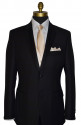 black San Miguel tuxedo with long champagne dress tie and champagne vest and pocket handkerchief