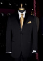 black tuxedo with gold silk long tie and pocket hanky