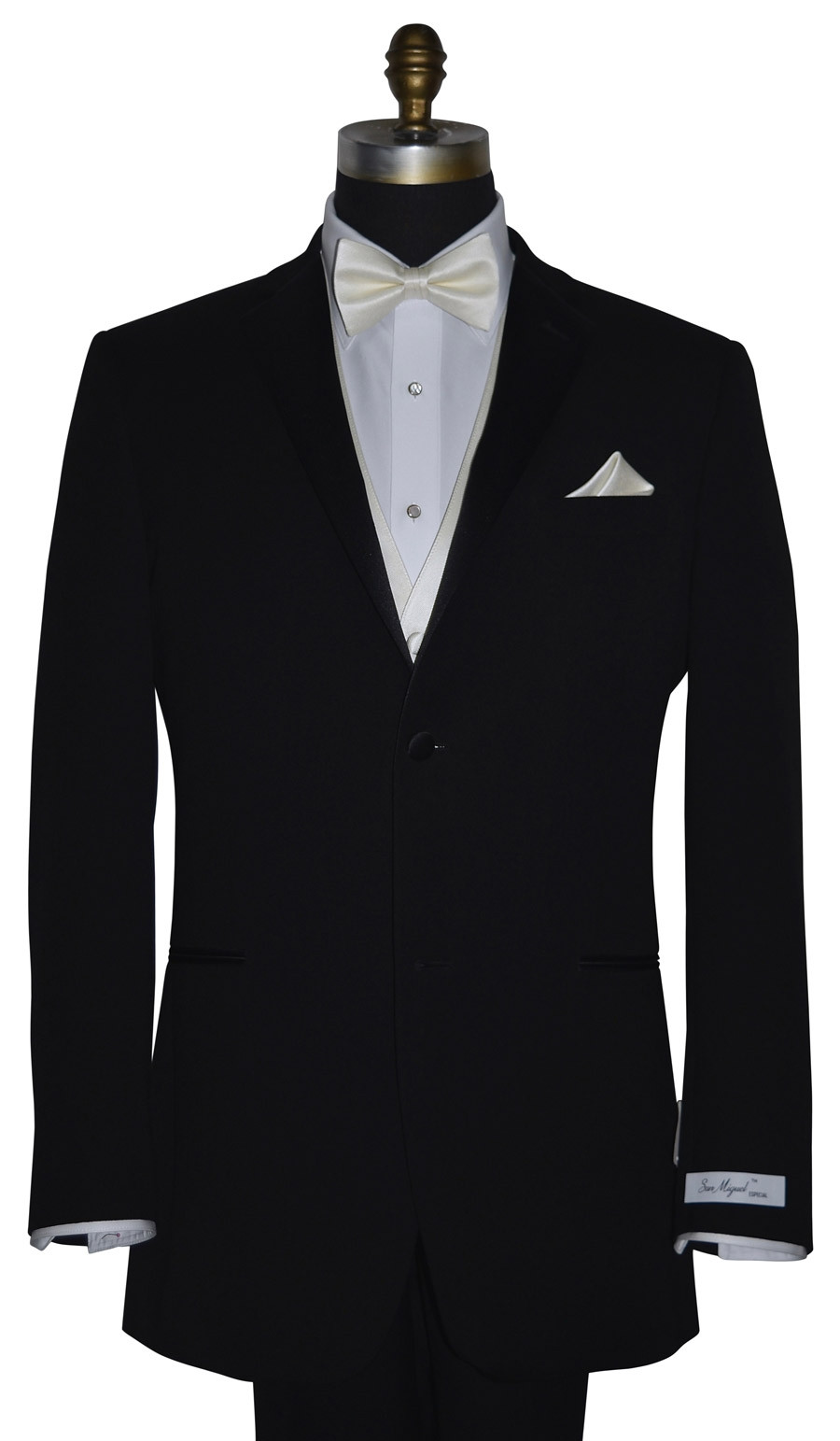 San Miguel black tuxedo with ivory pre-tied bowtie and ivory vest and ivory pocket handkerchief